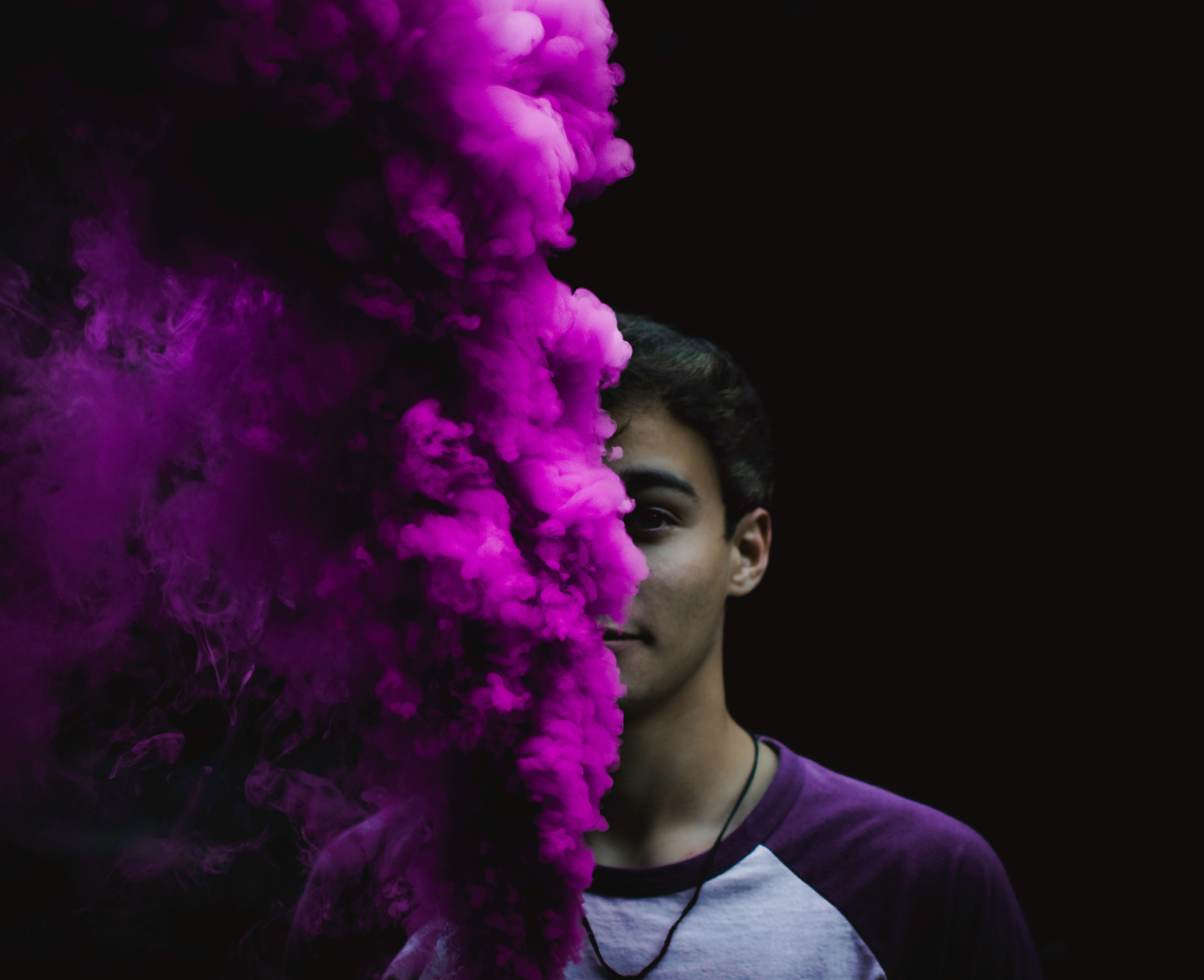 man in purple and grey shirt